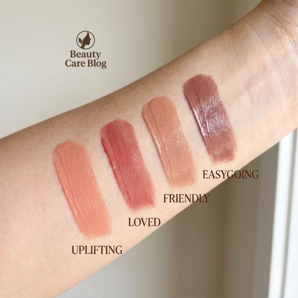 Arm swatches showing all four Rare Beauty Lip Butter shades in natural lighting.
